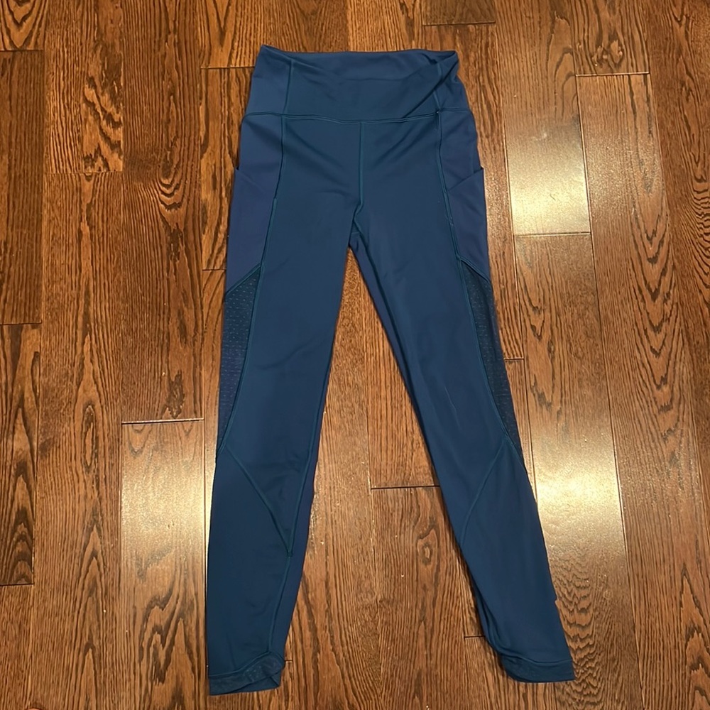 Royal blue lululemon leggings size 4 with mesh siding